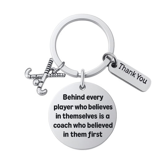 Field hockey coach keychain with crossed sticks charm, Thank You charm, and engraved Behind Every Player quote