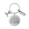 Field hockey coach keychain with crossed sticks charm, Thank You charm, and engraved Sees Beyond Your Limits quote
