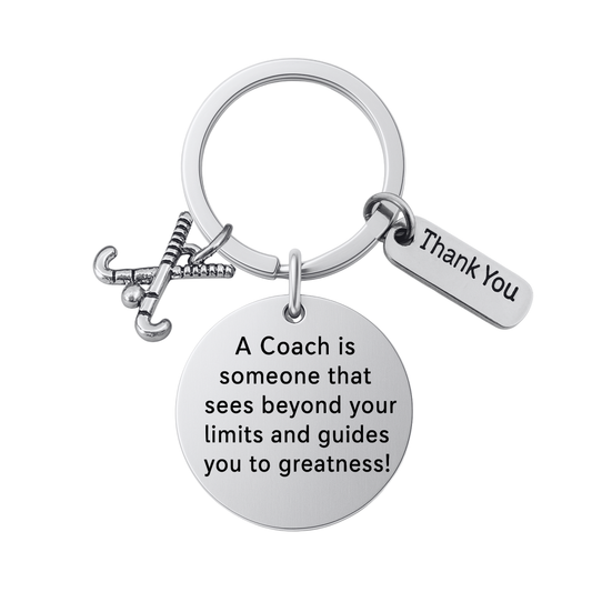 Field hockey coach keychain with crossed sticks charm, Thank You charm, and engraved Sees Beyond Your Limits quote