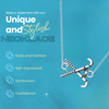 Silver field hockey connector necklace on blue surface with engraved quote card