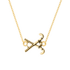 Gold-tone field hockey pendant necklace with stick and ball charm on white background