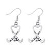 Silver heart-shaped field hockey stick dangle earrings with crossed sticks and ball design