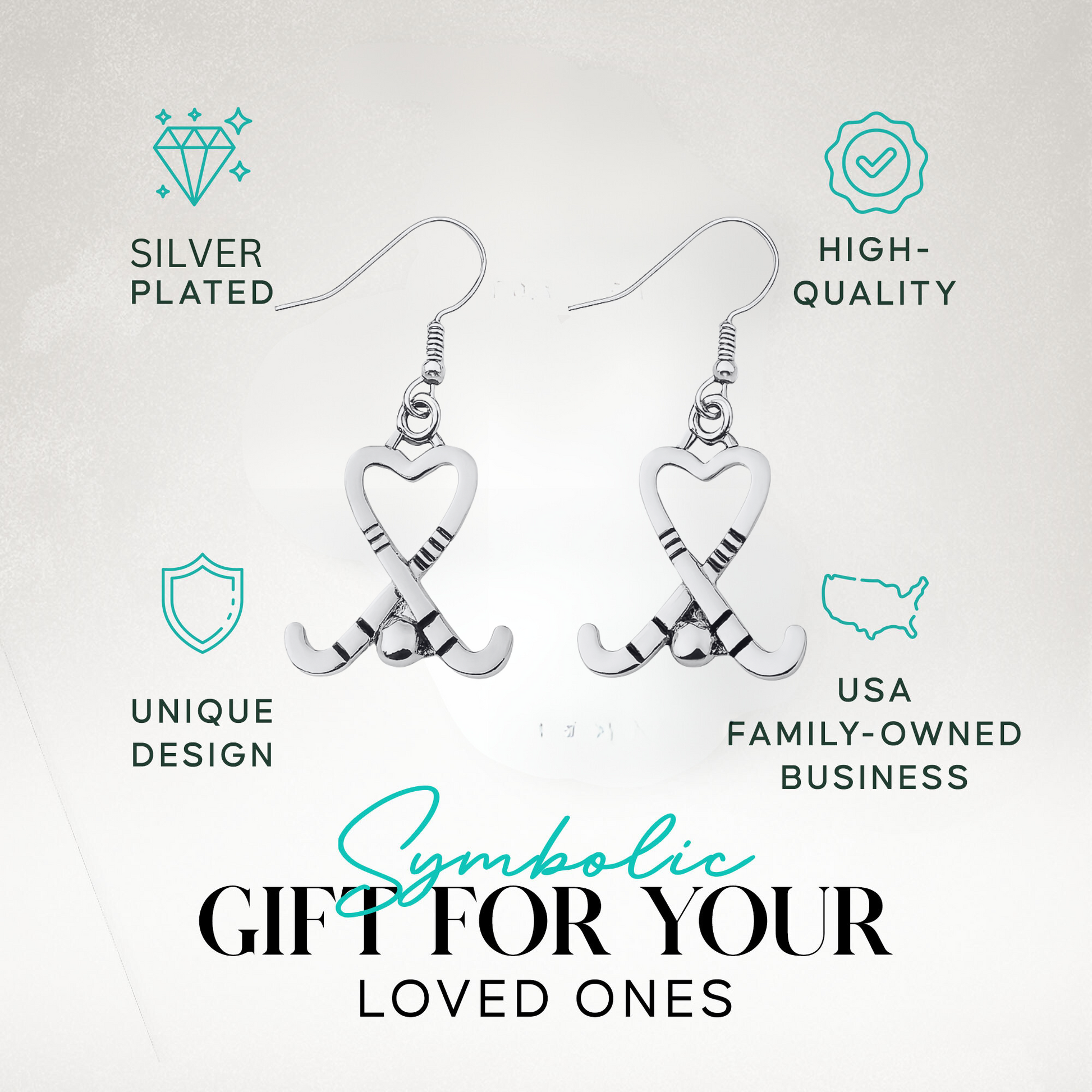 Silver heart-shaped field hockey stick earrings with text highlighting unique style and gift idea