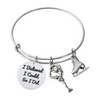 Figure skating bangle bracelet with I Think I Can charm and ice skate charm on silver band