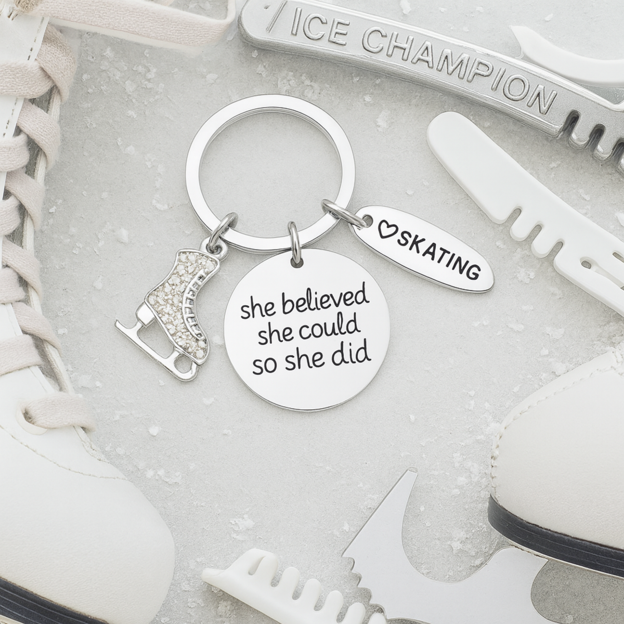 Figure skater charm keychain with motivational engraved disc and 'Skating' tag
