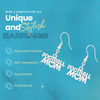 Silver Football Mom earrings displayed on rustic wooden surface