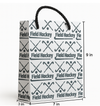 Field hockey gift bag featuring stylish design and sturdy handles, perfect for birthdays and special occasions.