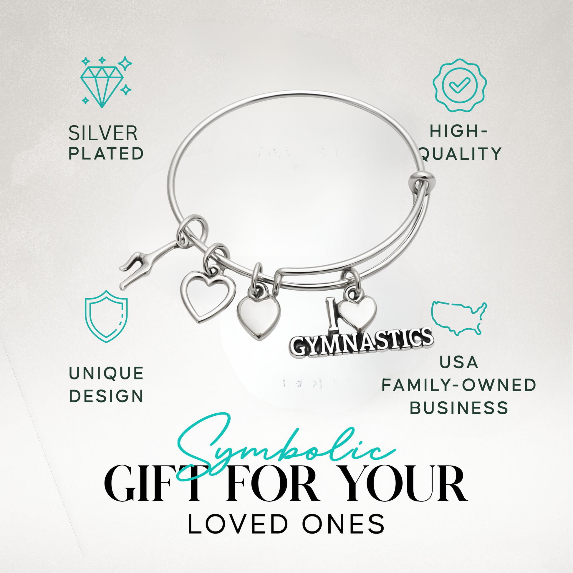 Silver gymnastics bracelet with heart and gymnast charms, shown on display card with product info