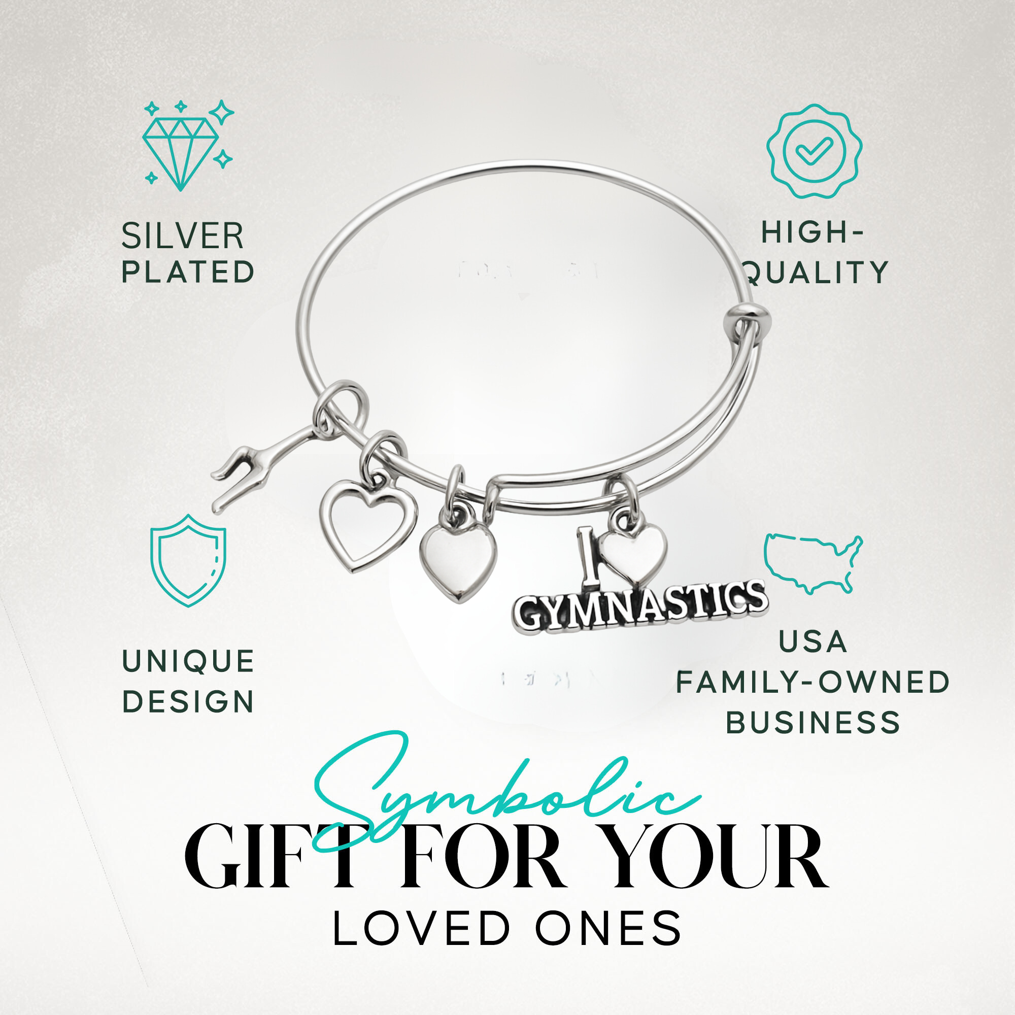 Silver gymnastics bracelet with heart and gymnast charms, shown on display card with product info