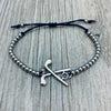 girls golf bracelet featuring silver-tone beads and a 3D golf charm with crossed clubs and ball