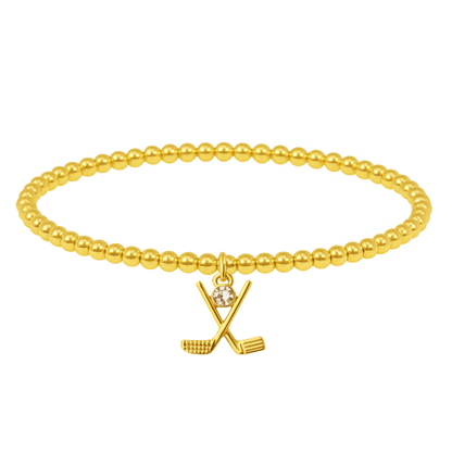 Elegant women’s bracelet with gold beads and a miniature crossed golf club pendant, ideal golf jewelry gift