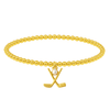 Women’s beaded gold bracelet featuring a small charm of crossed golf clubs