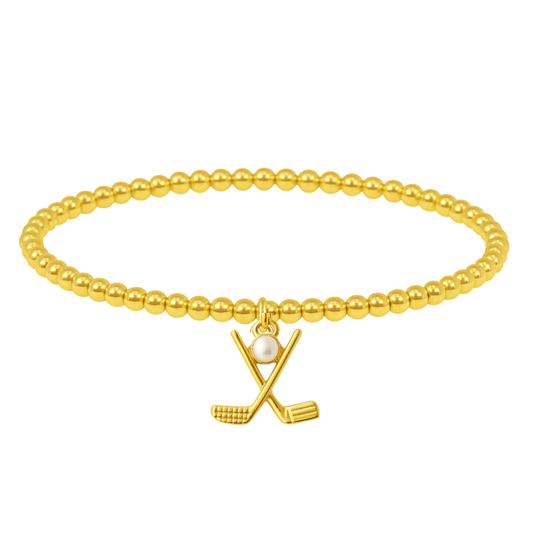 Women’s beaded gold bracelet featuring a small charm of crossed golf clubs