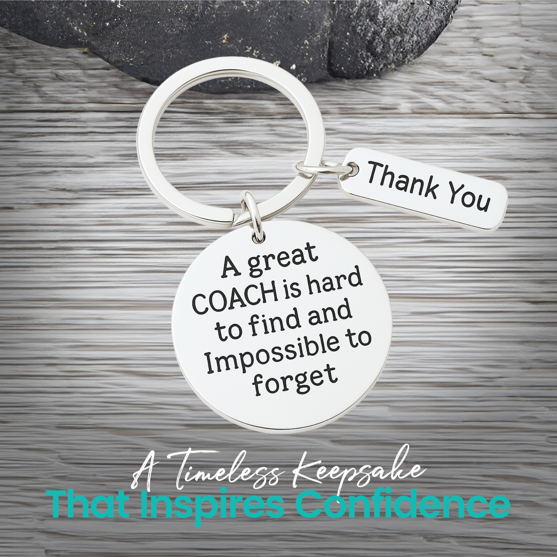 Silver coach keychain with engraved A Great Coach Is Hard to Find But Impossible to Forget pendant on rustic wood