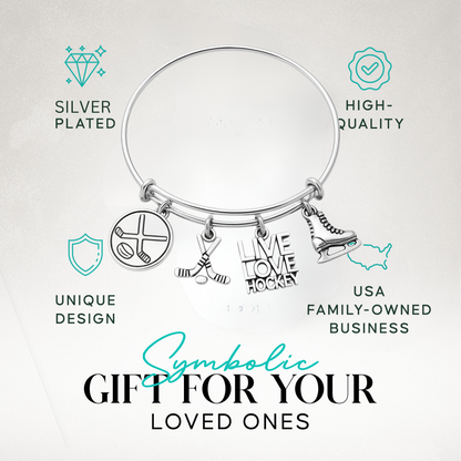 Ice hockey charm bangle bracelet with 'Live Love Hockey' charms in gift-ready packaging"