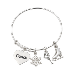 Silver plated figure skating coach bangle bracelet with heart, snowflake, and skater charms