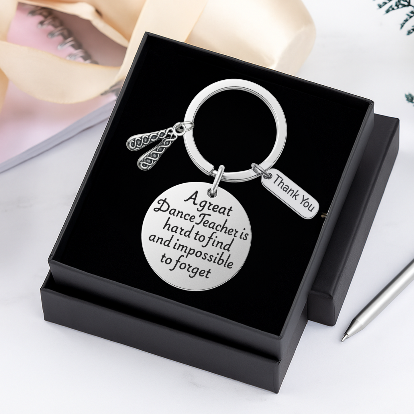 Gift-ready keychain displayed in a black box with Irish dance charms and quote disc