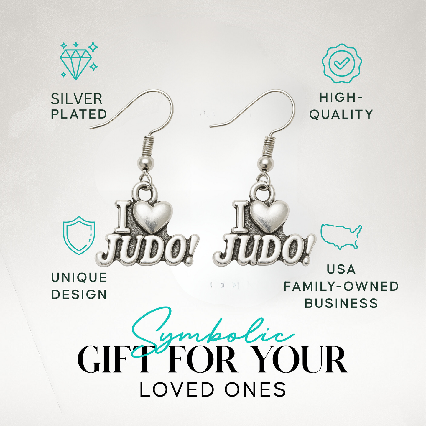 “I Love Judo” earrings displayed in branded packaging with icons for durability and hypoallergenic features