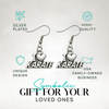Karate-themed earrings displayed in gift-ready packaging with icons for hypoallergenic and durable design