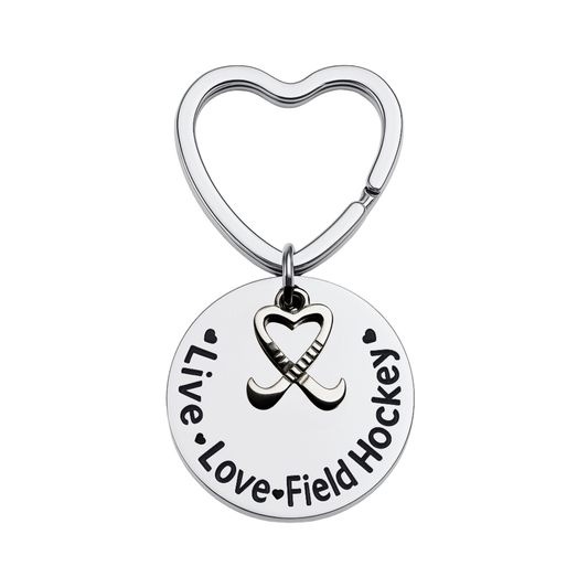 Silver heart-shaped keychain with engraved Live Love Field Hockey charm on white background