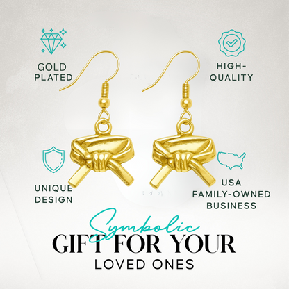 Close-up of gold martial arts belt earrings in premium display packaging with product icons