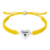 Yellow bracelet with engraved stainless steel heart charm and martial arts icon