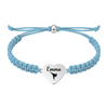 Light blue bracelet with engraved stainless steel heart featuring martial arts belt icon
