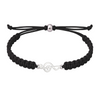 Black rope bracelet featuring a silver music note charm with a secure slip-knot closure