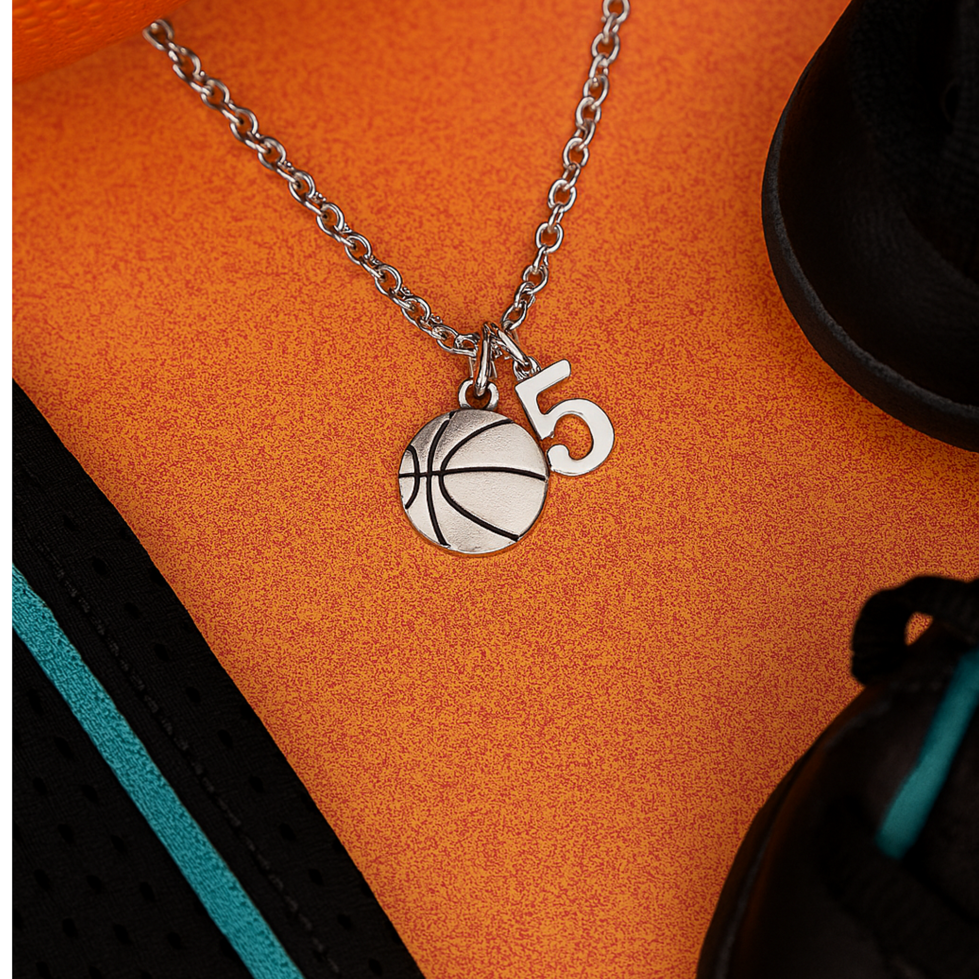 Silver basketball necklace with personalized jersey number charm on stainless steel chain