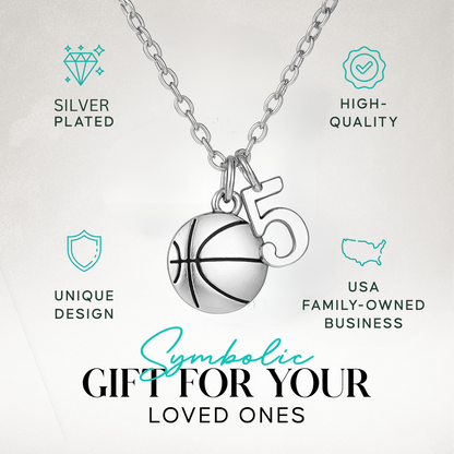 Close-up of personalized basketball necklace worn with activewear for sporty style