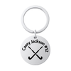 Stainless steel field hockey keychain engraved with name or number and crossed sticks design on white background