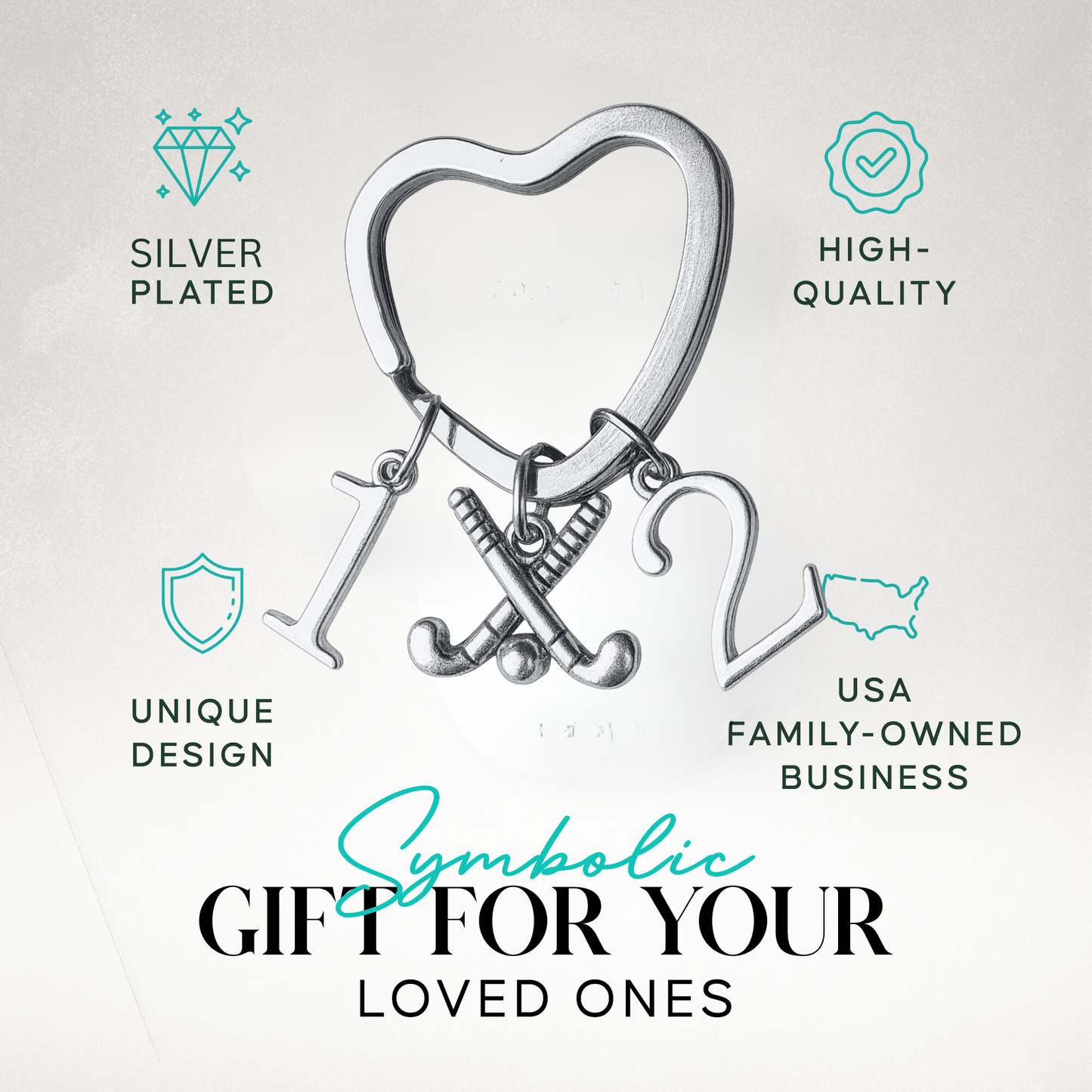 Field hockey heart keychain with number charms shown with text highlighting perfect gift idea