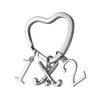 Silver plated heart-shaped field hockey keychain with crossed sticks charm and number charms