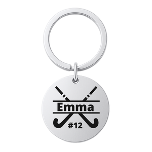 Stainless steel field hockey stick keychain engraved with name on white background