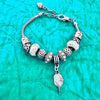 Pickleball Paddle Beaded Bracelet on Blue Background
