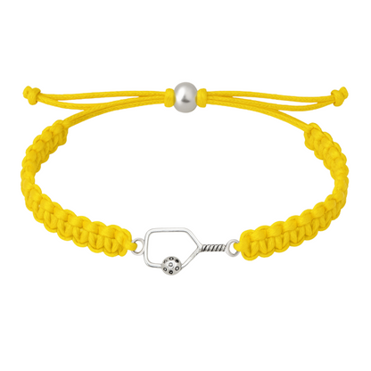 Bright yellow bracelet featuring a silver pickleball paddle charm