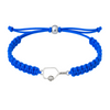 Blue bracelet with a silver pickleball paddle charm laid flat