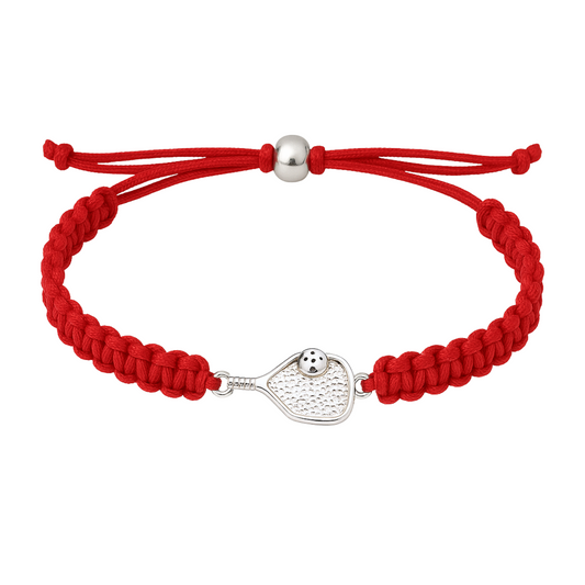 Red pickleball rope bracelet with silver paddle charm and adjustable knot closure, sporty gift for players.