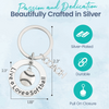 Silver-plated softball keychain with "Live Love Softball" engraved ring and stitched ball charm for team coaches