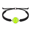 Black tennis bracelet with vibrant green ball charm, unisex sports accessory with durable woven cord