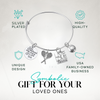 Tennis player gift bracelet with inspirational quote charm and racket pendant, featured in blue gift layout