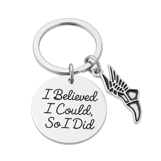 Silver track and field keychain with 'I Believed I Could So I Did' charm and running shoe pendant