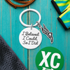 Inspirational running keychain with silver shoe charm and 'I Believed I Could So I Did' disc on cross country card