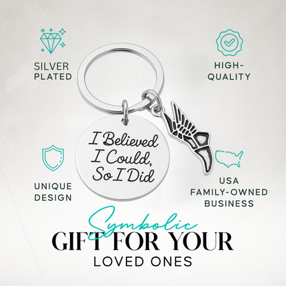 Track and field motivational keychain in Sportybella gift-ready packaging