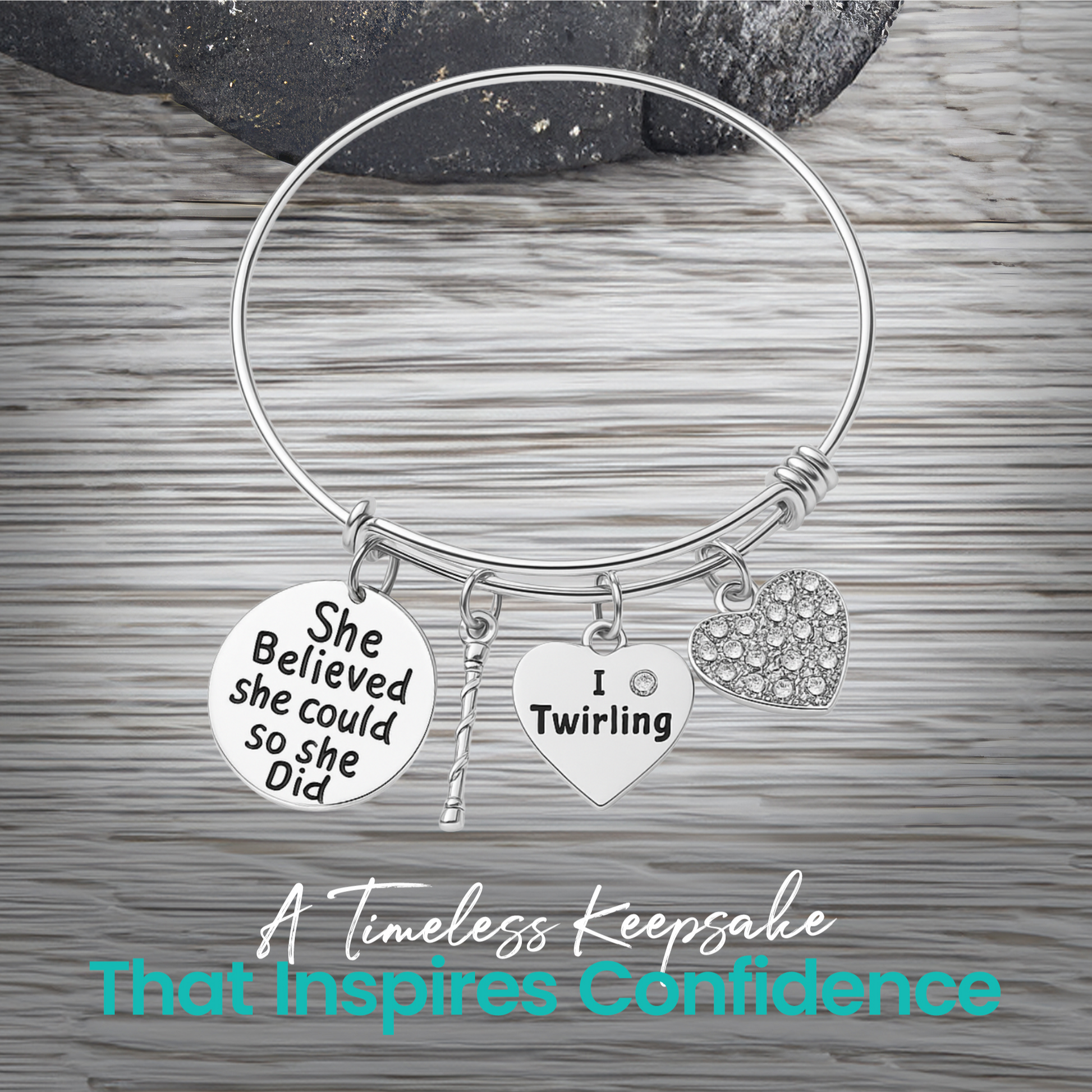 Silver twirling bangle bracelet photographed on wood background with message "I twirl therefore I sparkle"