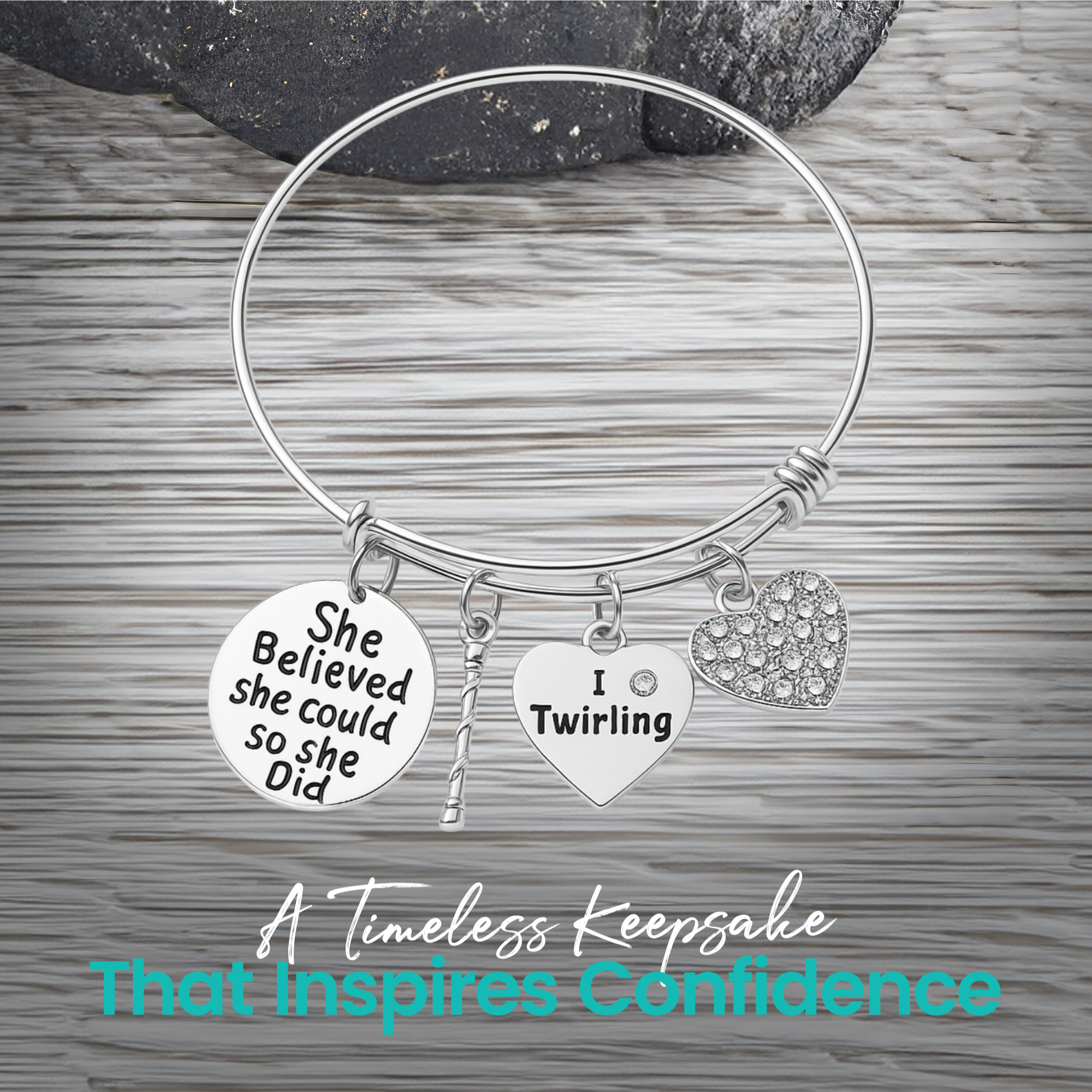 Silver twirling bangle bracelet photographed on wood background with message "I twirl therefore I sparkle"