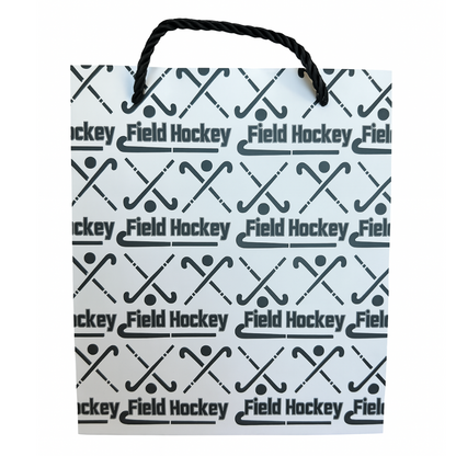 Field hockey gift bag with printed designs, ideal for birthdays and special events, made from premium paper.