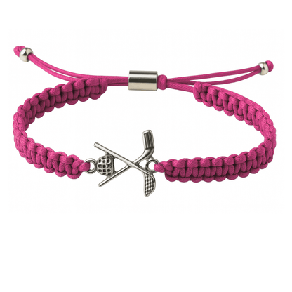 Pink adjustable cord bracelet with a silver golf club and ball charm, displayed as a golf-themed jewelry gift for girls