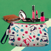 Golf wristlet featuring golf-themed pattern, perfect for holding keys, ID, cash, and makeup. A stylish golf gift accessory.