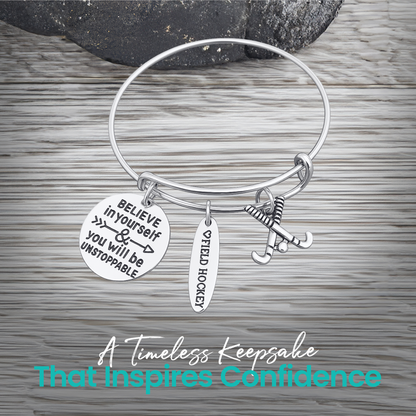 Field hockey inspirational charm bracelet with text highlighting unique design and perfect gift idea